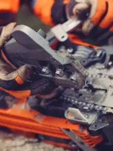 Husqvarna 564 XPG fastlåse sværdmøtrikker